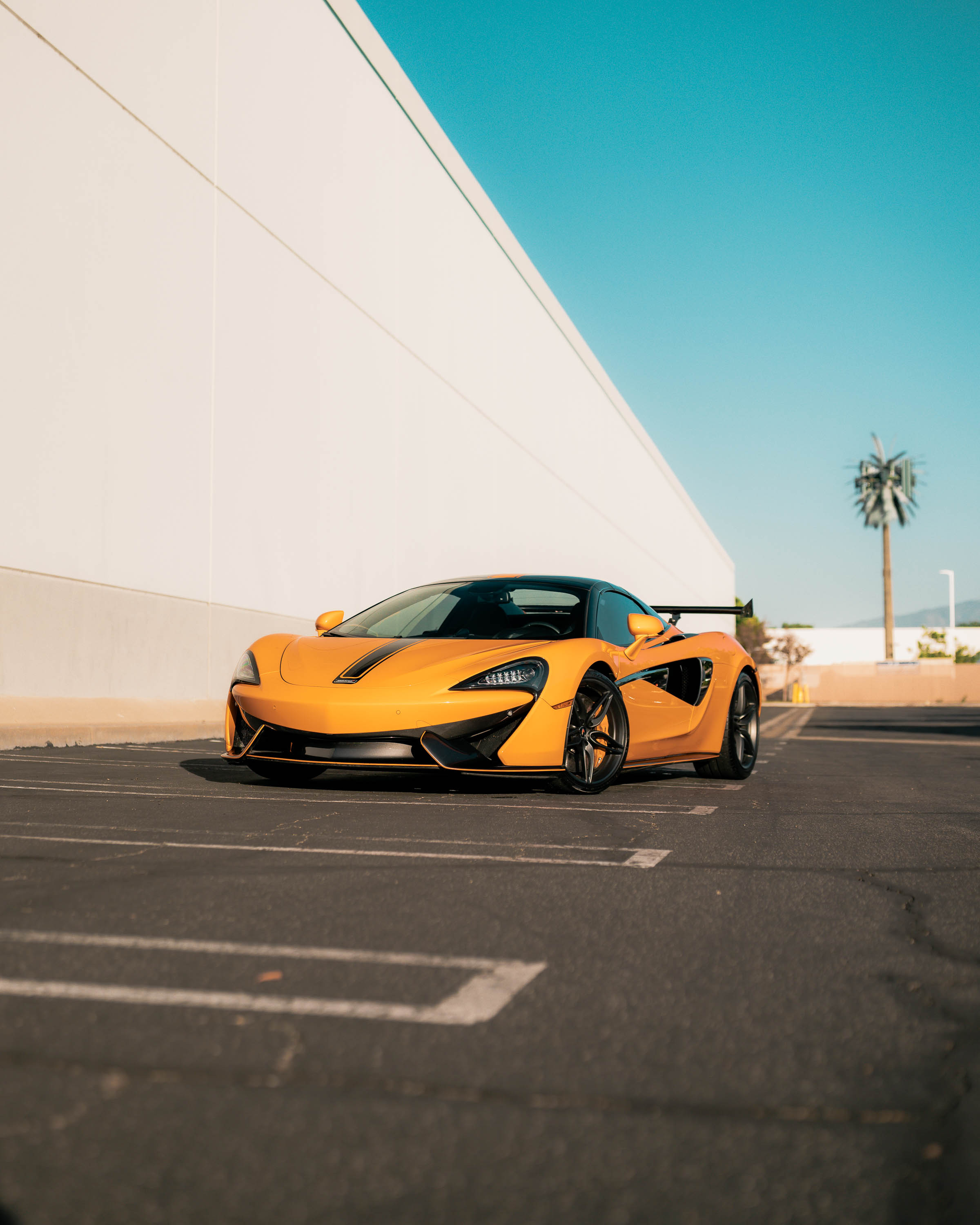 McLaren 570S in papaya orange with paint protection film